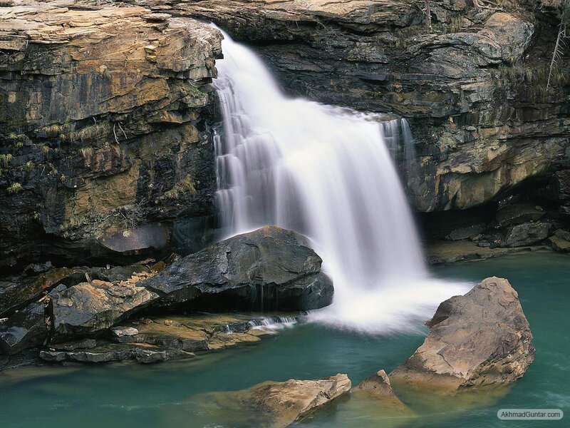 Waterfall in Canyon — Blue, Serene, Photograph, Rocks