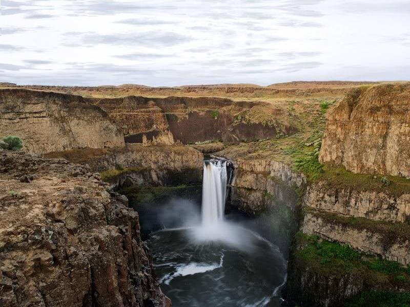 Waterfall in Canyon — Brown, Dramatic