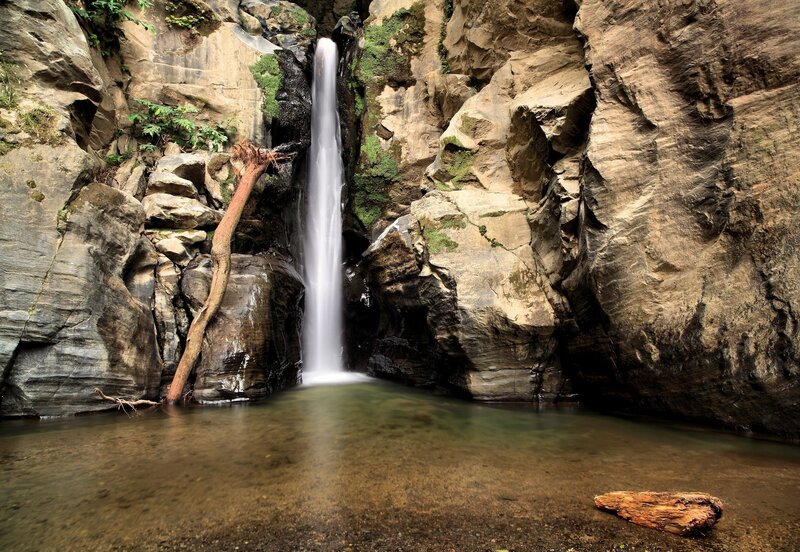 Waterfall in Canyon — Brown, Serene, Photograph, Pool, Tree Trunk