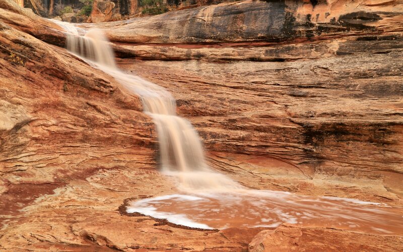 Waterfall in Canyon — Brown, Serene, Photograph, Rock