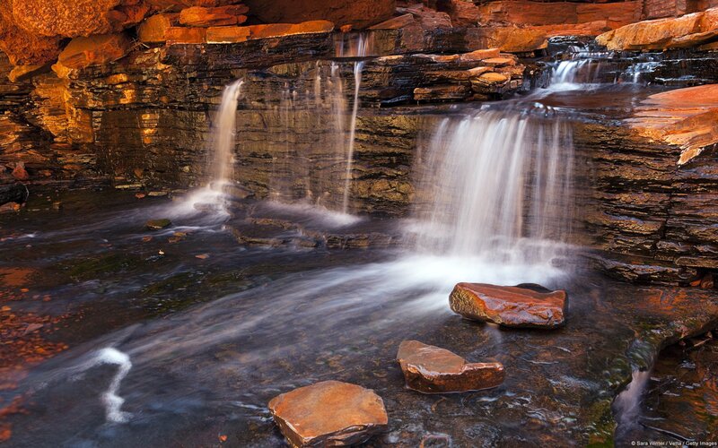 Waterfall in Canyon — Brown, Serene, Sunset, Photograph, Rocks