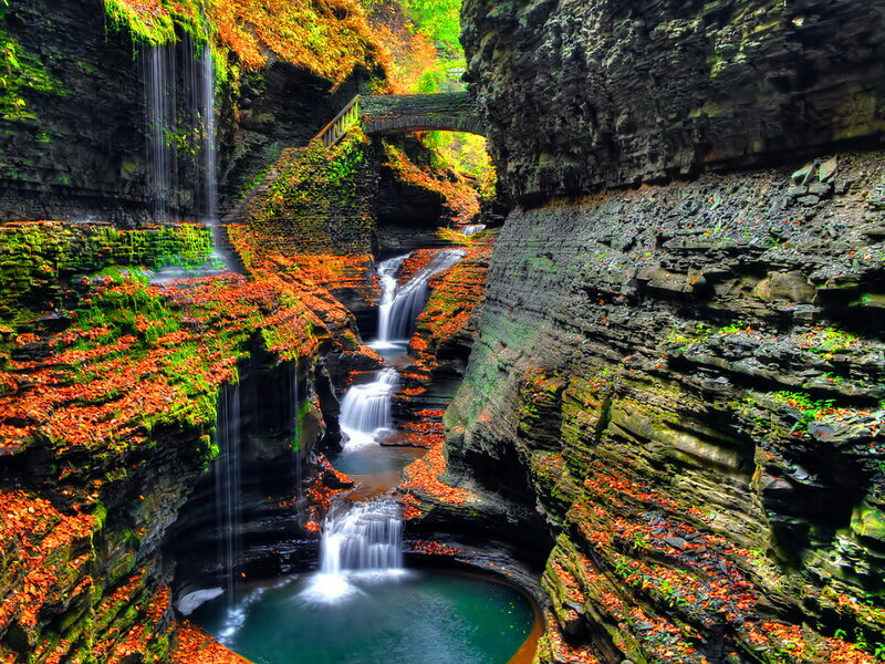 Waterfall in Canyon — Green, Serene, Autumn, Photograph, Bridge