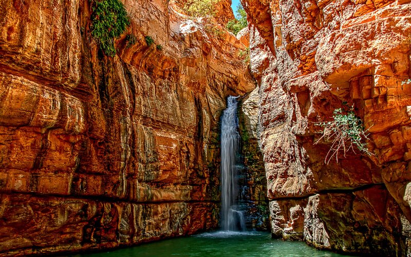 Waterfall in Canyon — Red, Dramatic, Afternoon, Photograph