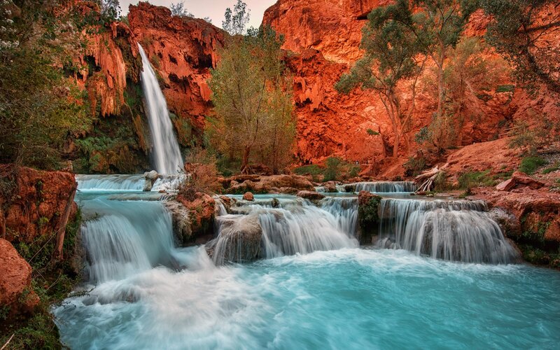 Waterfall in Canyon — Red, Serene, Sunset, Photograph, Trees