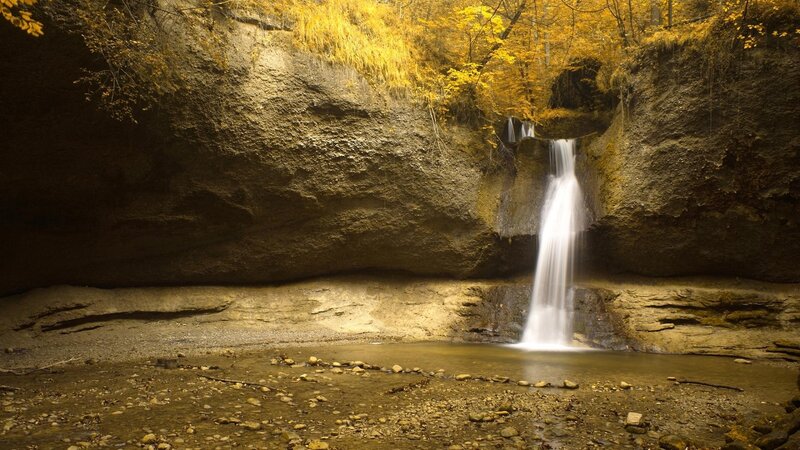 Waterfall in Canyon — Yellow, Serene, Autumn, Photograph, Trees, Rocks