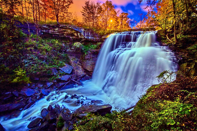 Waterfall in Forest — Blue, Dramatic, Sunset, Photograph, Trees, Rocks, River