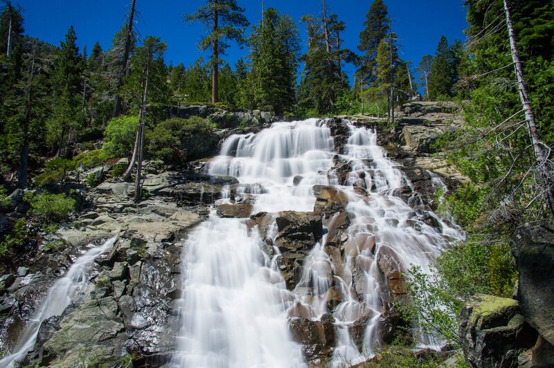 Waterfall in Forest — Blue, Serene, Afternoon, Photograph, Trees, Rocks, River, Green, White