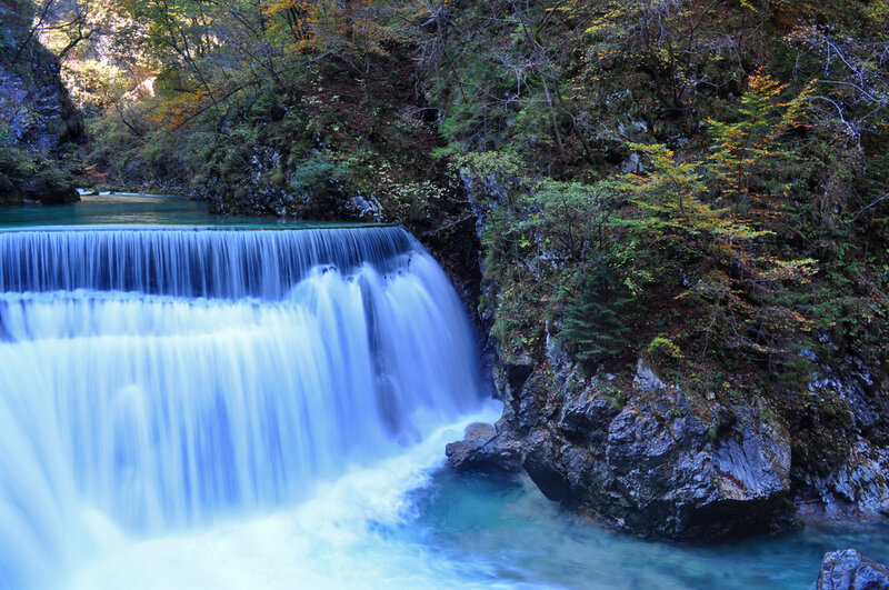 Waterfall in Forest — Blue, Serene, Autumn, Photograph