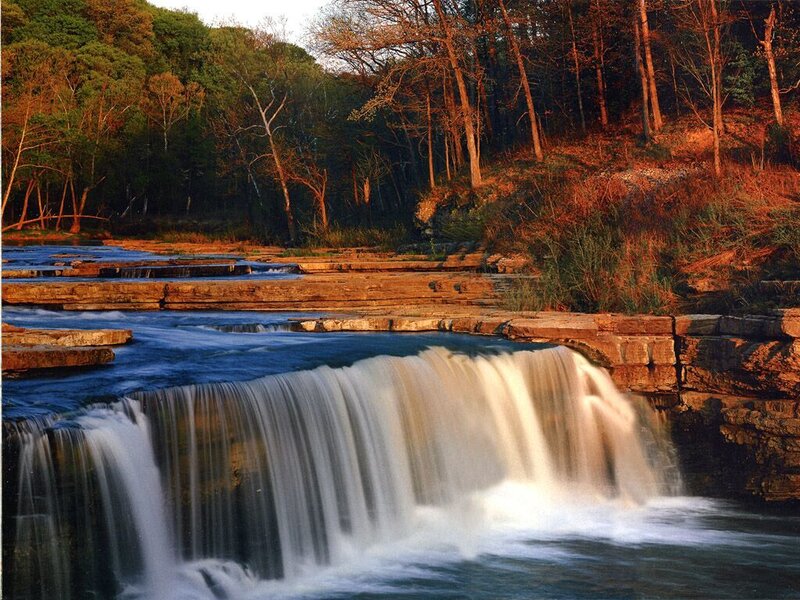 Waterfall in Forest — Blue, Serene, Sunset, Photograph, Trees, River, Rocks