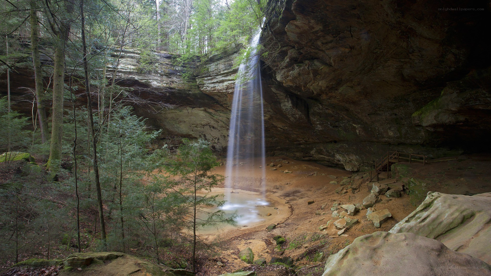 Waterfall in forest cave