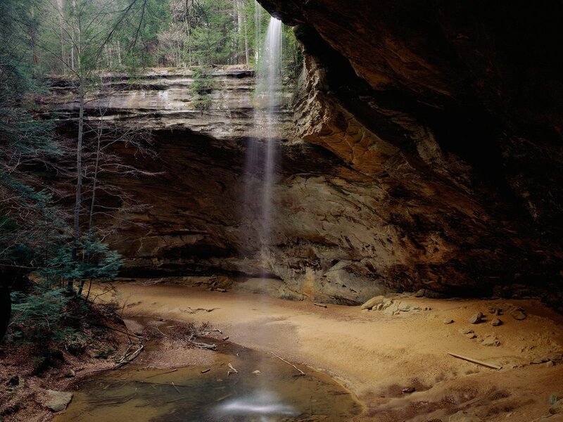 Waterfall in forest cave