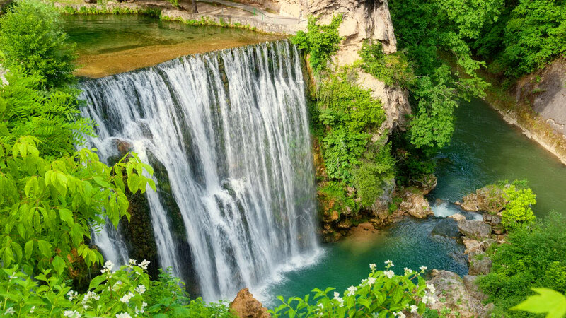 Waterfall in Forest — Green, Serene, Afternoon, Photograph, River, Trees, Rocks, Flowers
