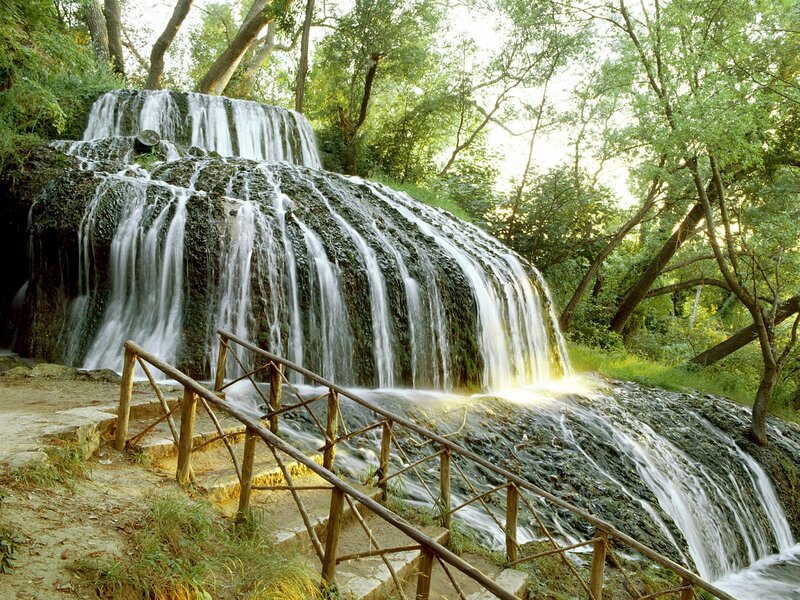 Waterfall in Forest — Green, Serene, Afternoon, Photograph, Trees, Railing