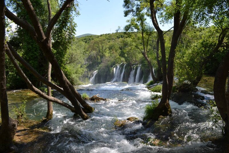 Waterfall in Forest — Green, Serene, Afternoon, Photograph, Trees, River, Mountain, Sky