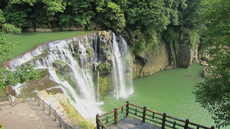 Waterfall in Forest — Green, Serene, Afternoon, Photograph, Trees, River, Path, Railing