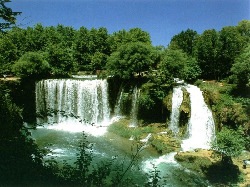 Waterfall in Forest — Green, Serene, Afternoon, Photograph, Trees, River, People