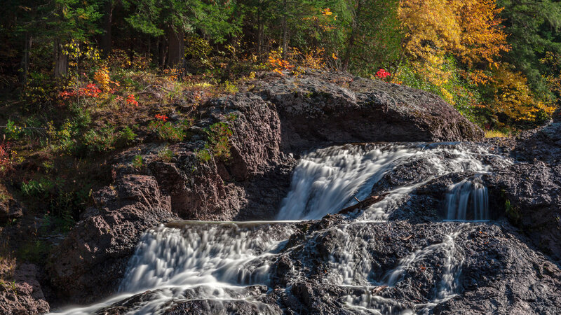 Waterfall in Forest — Green, Serene, Autumn, Photograph, Rocks, Trees, Autumn Leaves