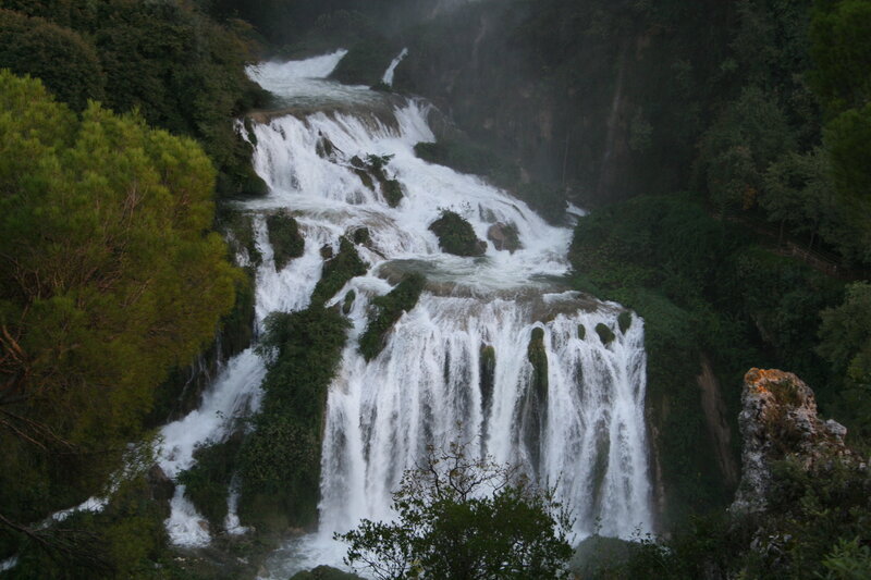 Waterfall in Forest — Green, Serene, Photograph, Trees, Rocks, Mist