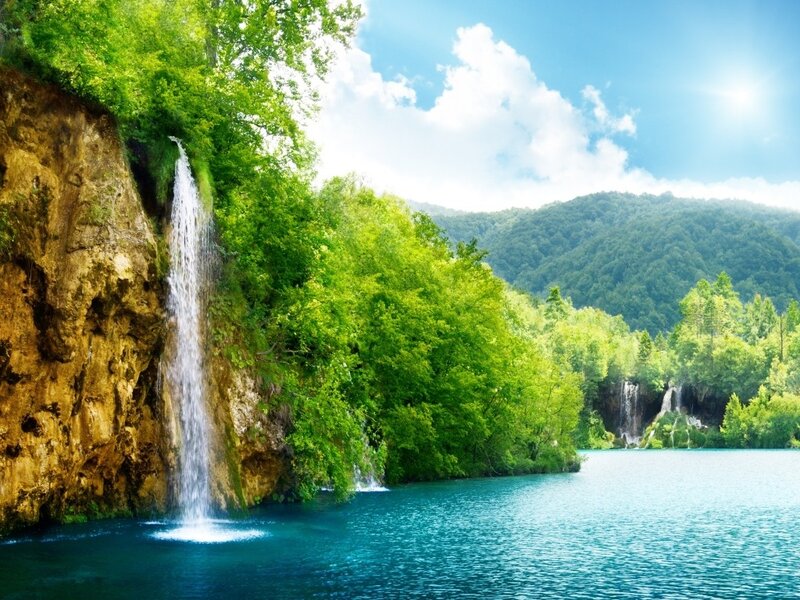 Waterfall in Forest Lake — Green, Serene