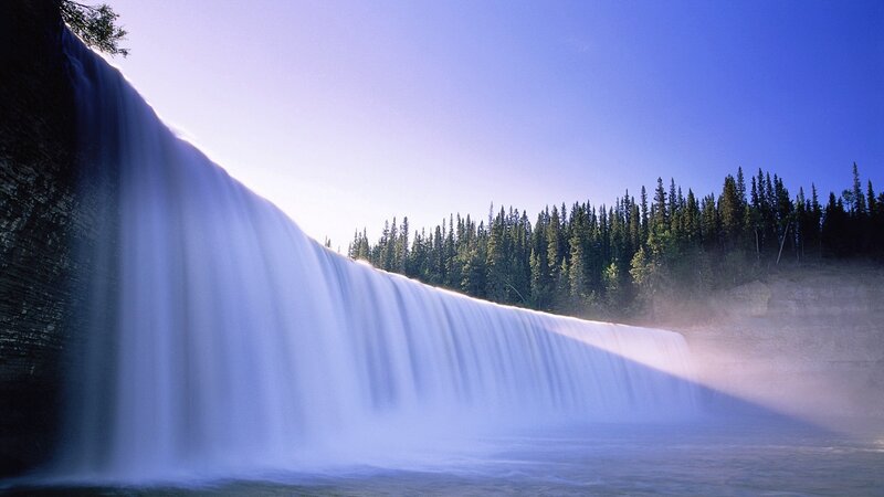 Waterfall in forest landscape