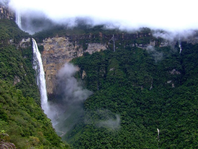 Waterfall in Forested Canyon — Green, Misty