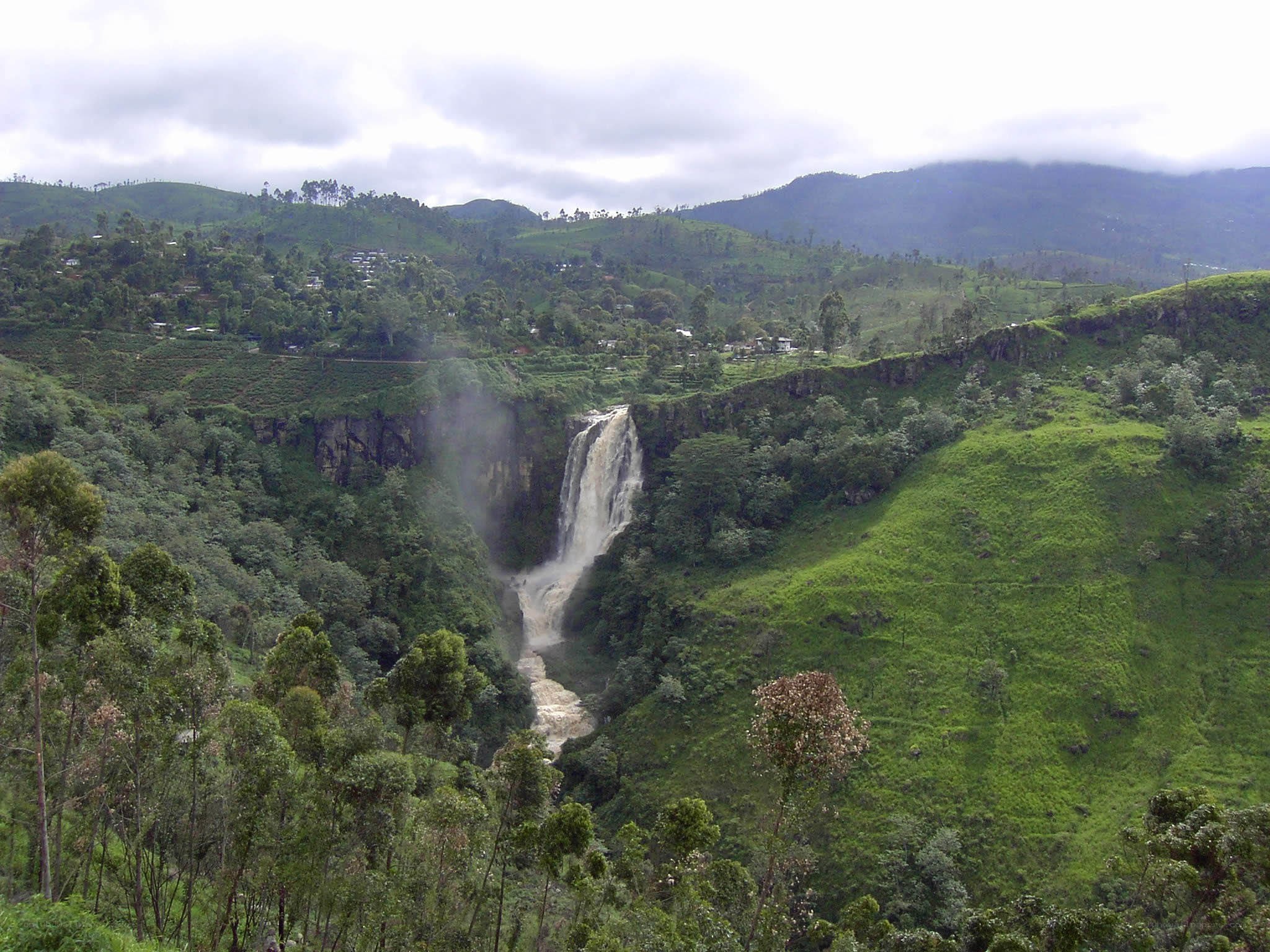 Waterfall in green hills