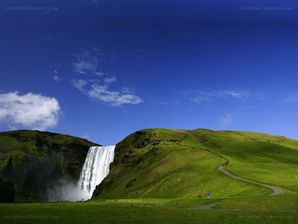 Waterfall in green landscape