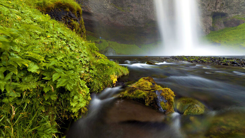 Waterfall in Green Landscape — Serene