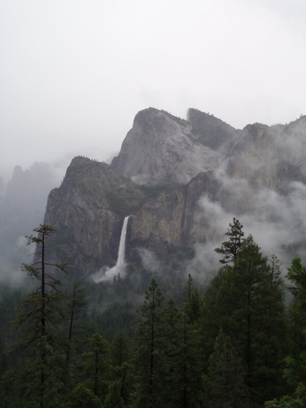 Waterfall in misty mountains
