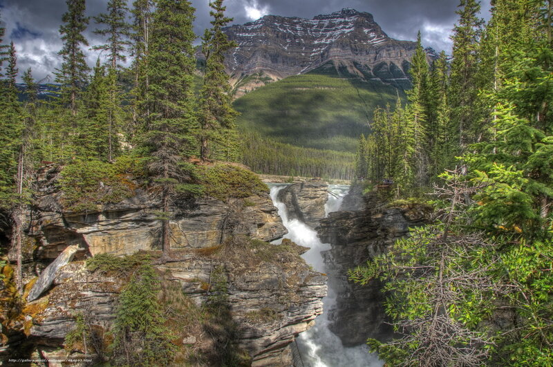 Waterfall in mountain canyon