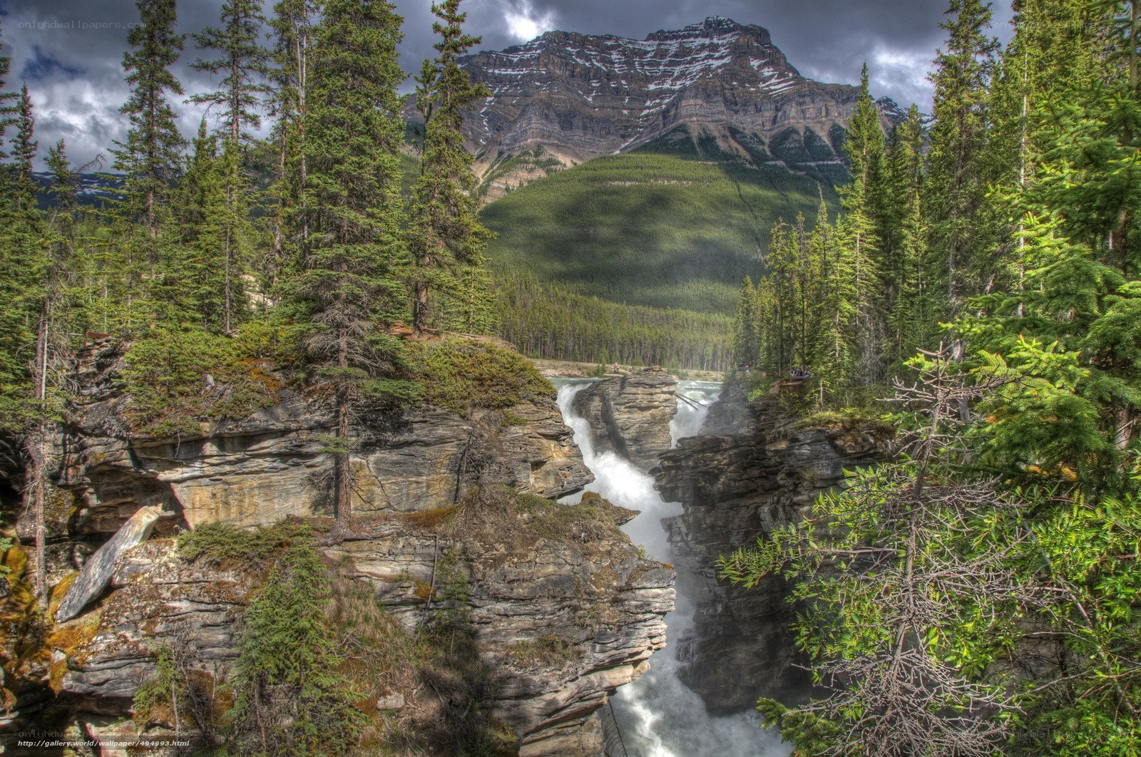 Waterfall in mountain canyon
