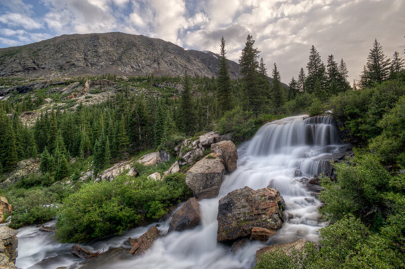 Waterfall in Mountain Forest — Green