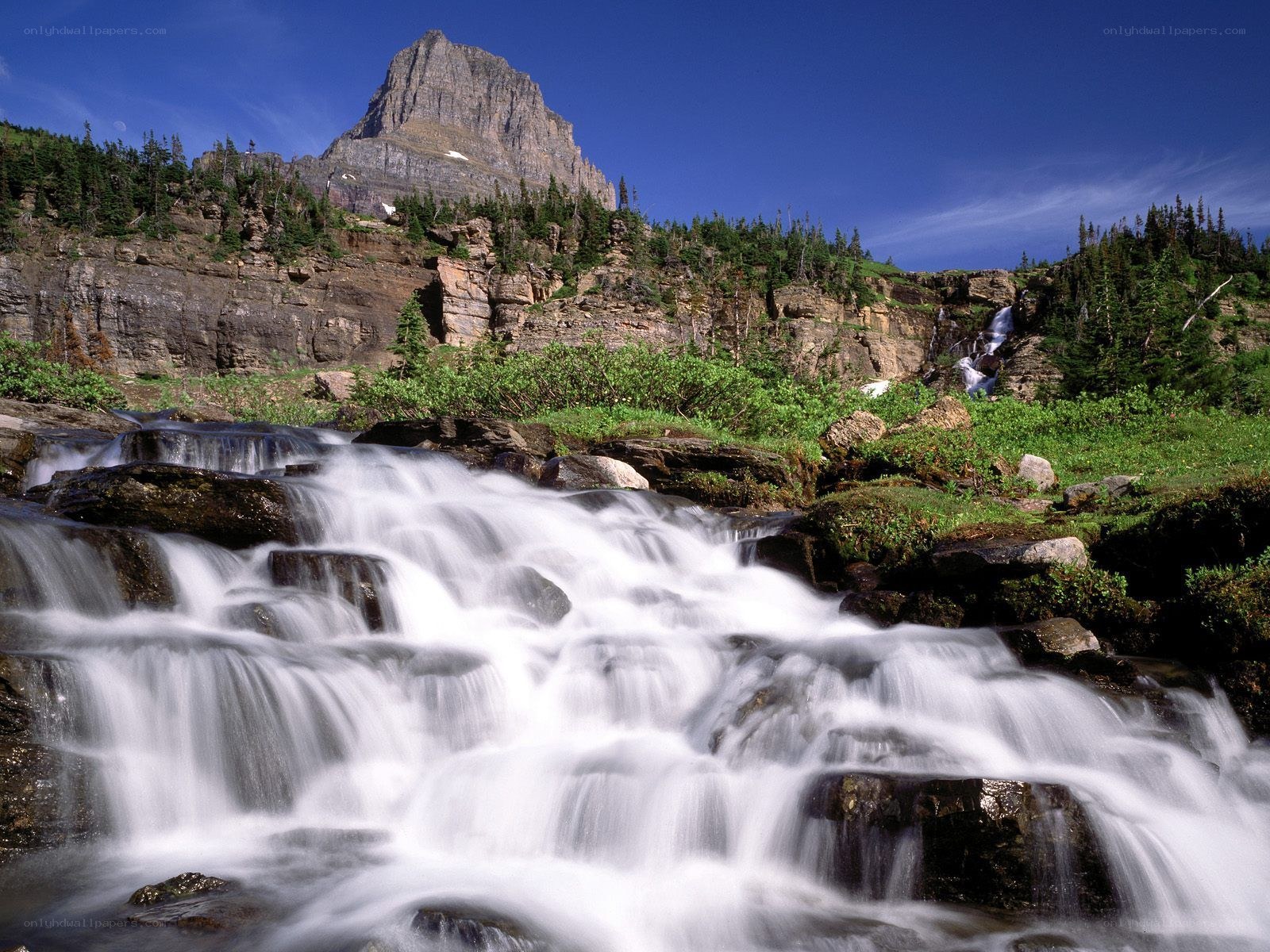 Waterfall in mountain landscape