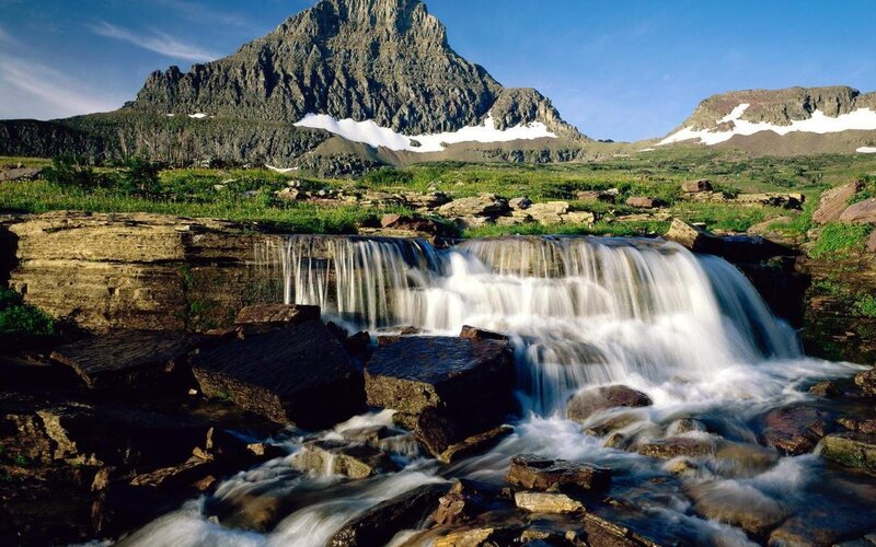 Waterfall in mountain landscape