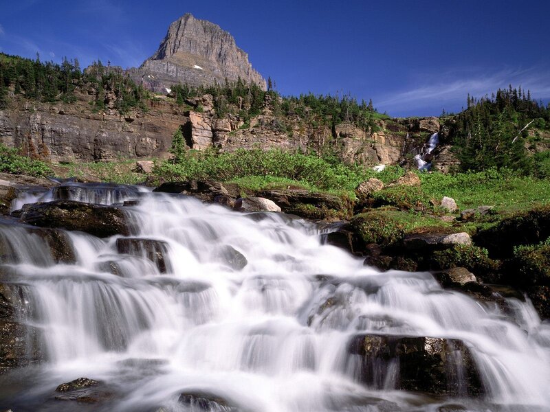 Waterfall in mountain landscape