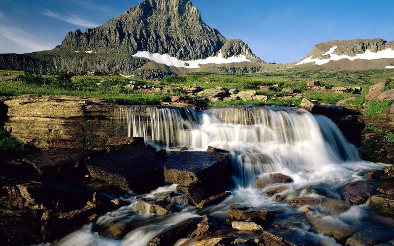 Waterfall in mountain landscape