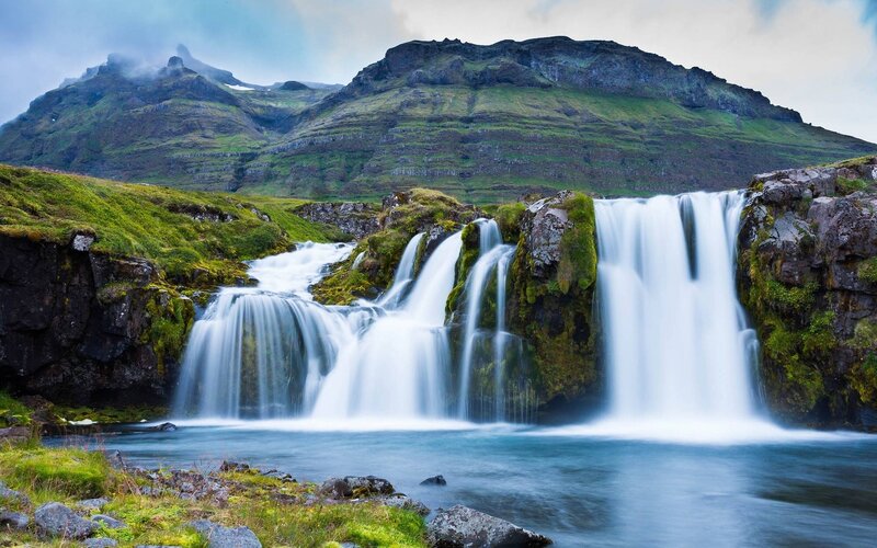 Waterfall in Mountain Landscape — Green