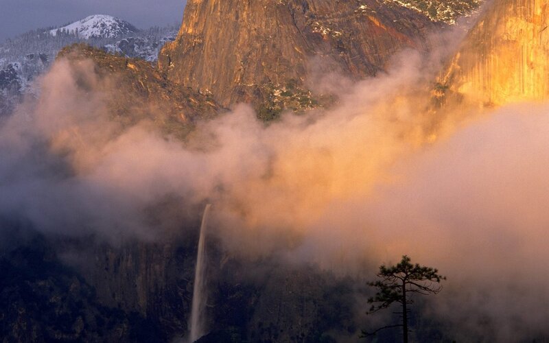 Waterfall in mountain mist
