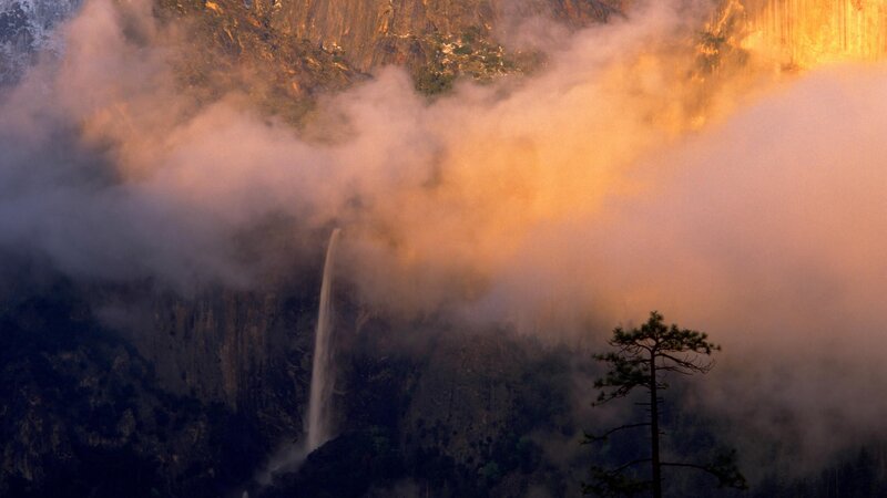 Waterfall in mountain mist