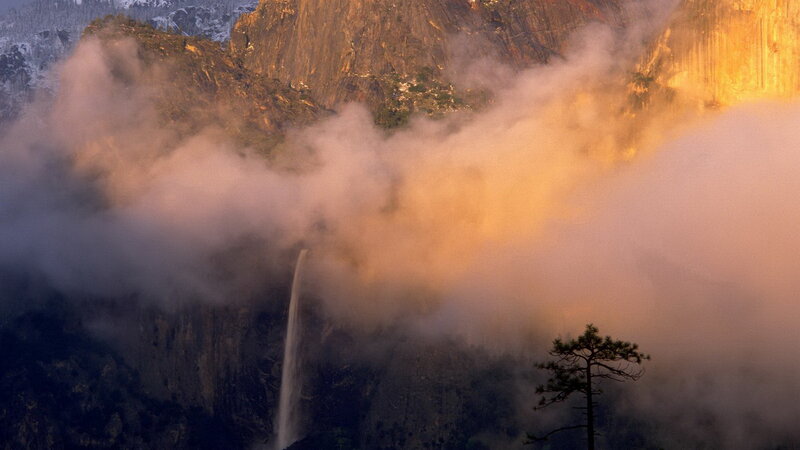 Waterfall in mountain mist