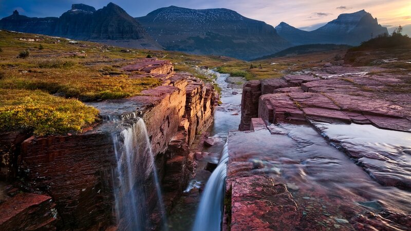 Waterfall in mountain valley