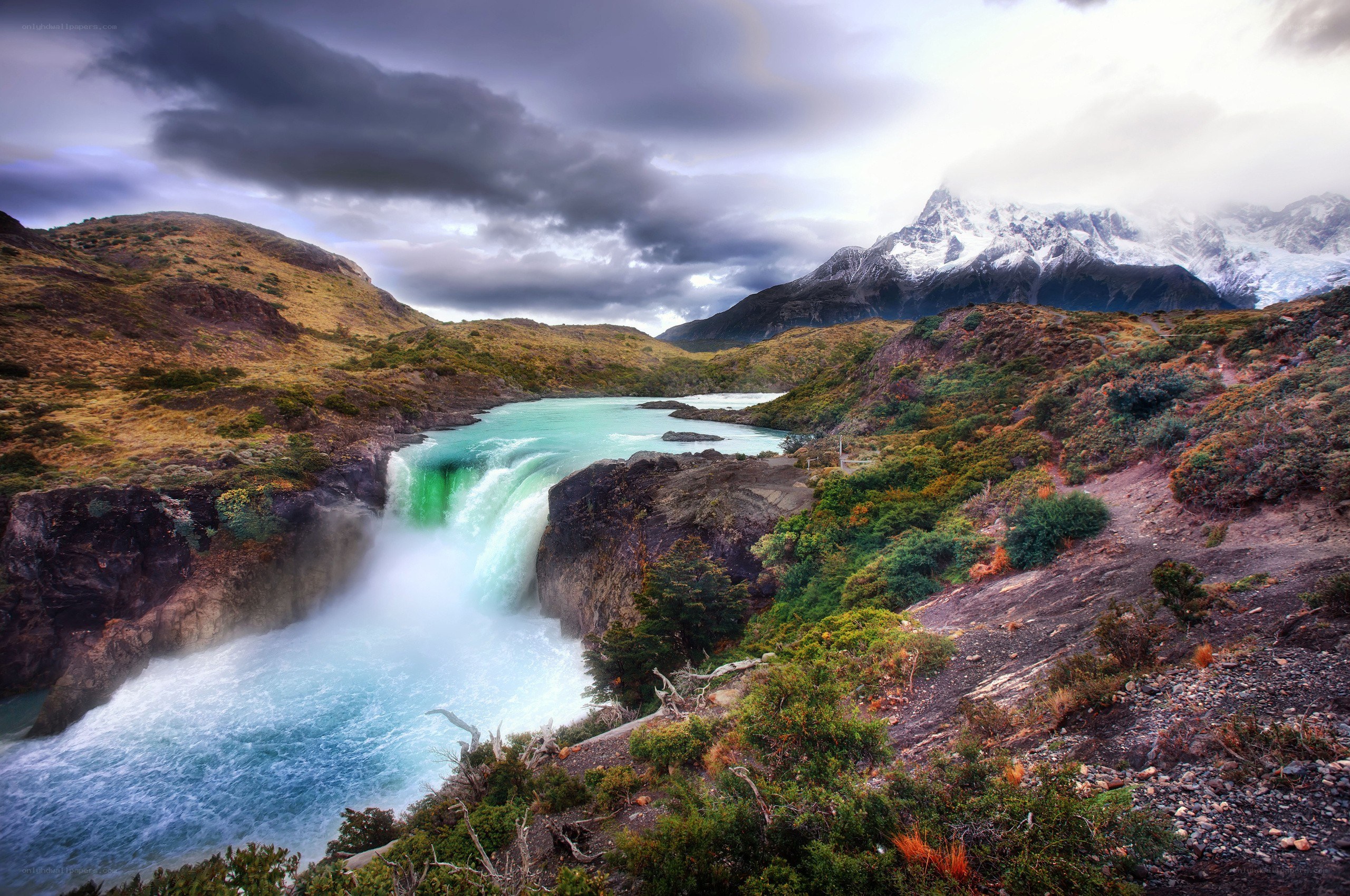 Waterfall in mountain valley