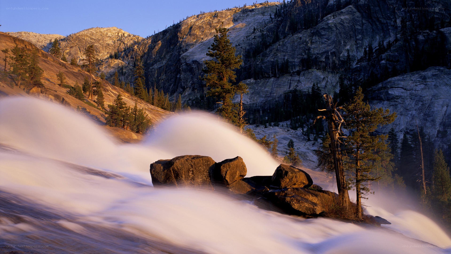 Waterfall in mountain valley