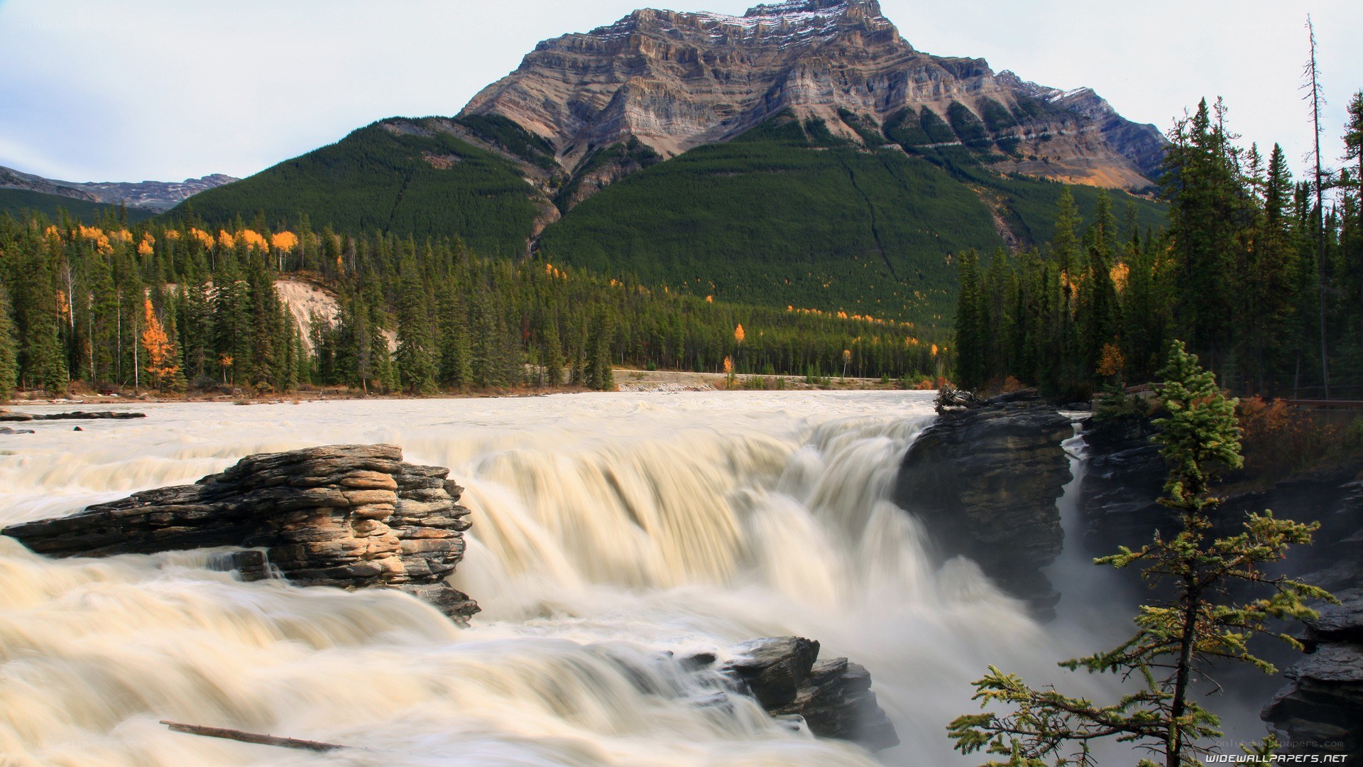 Waterfall in mountain valley