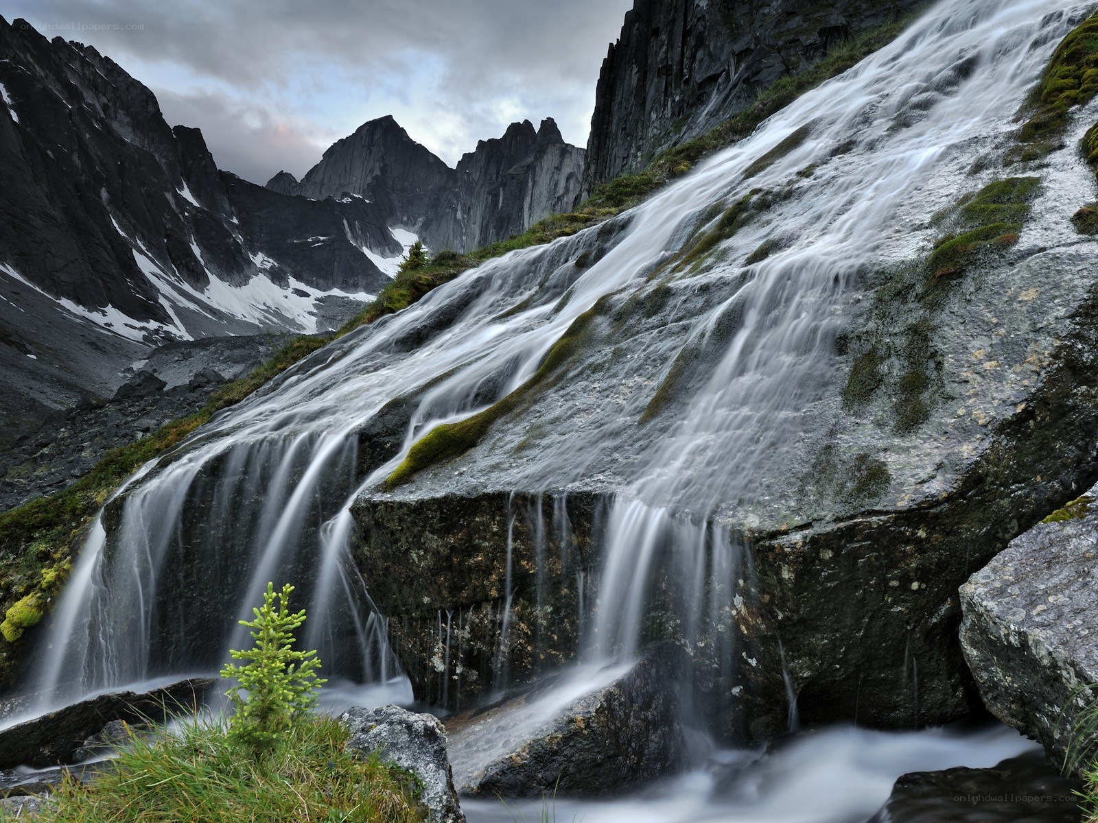 Waterfall in mountain valley