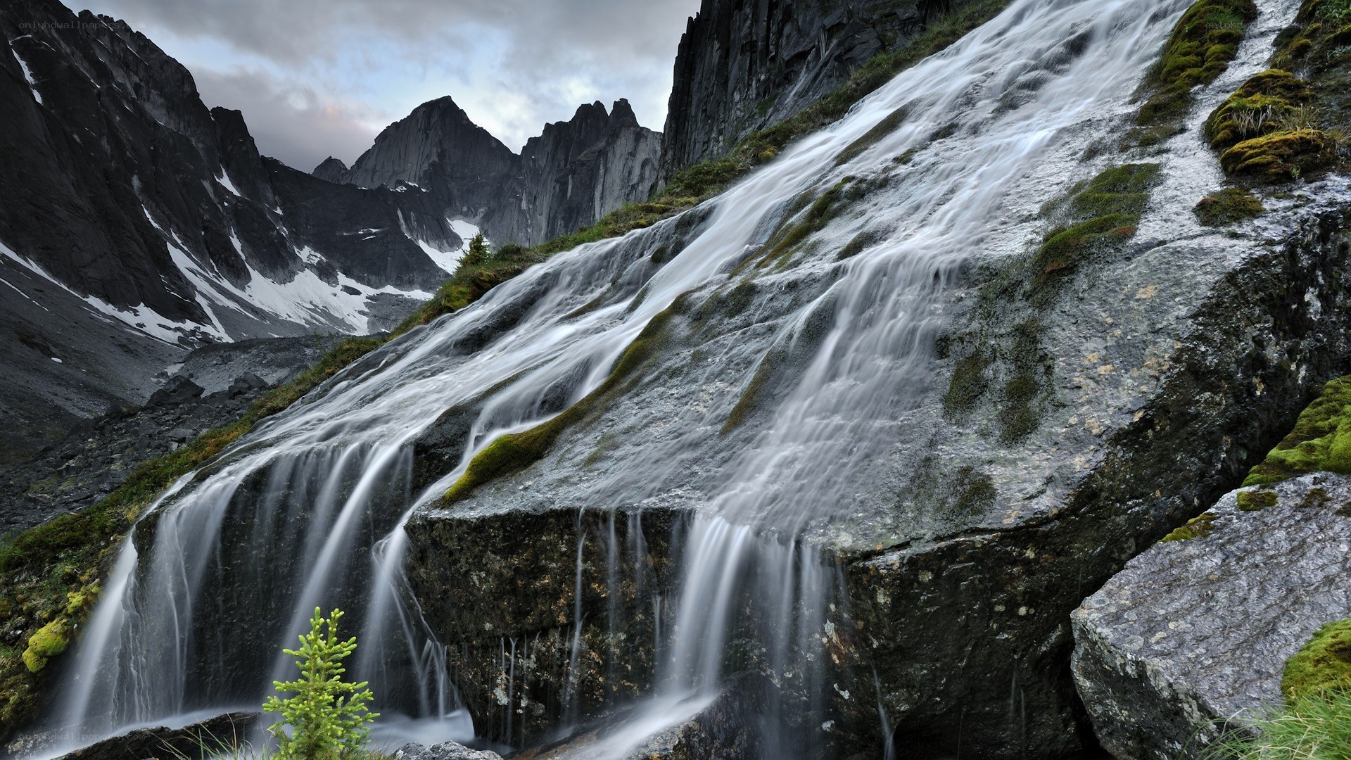Waterfall in mountain valley