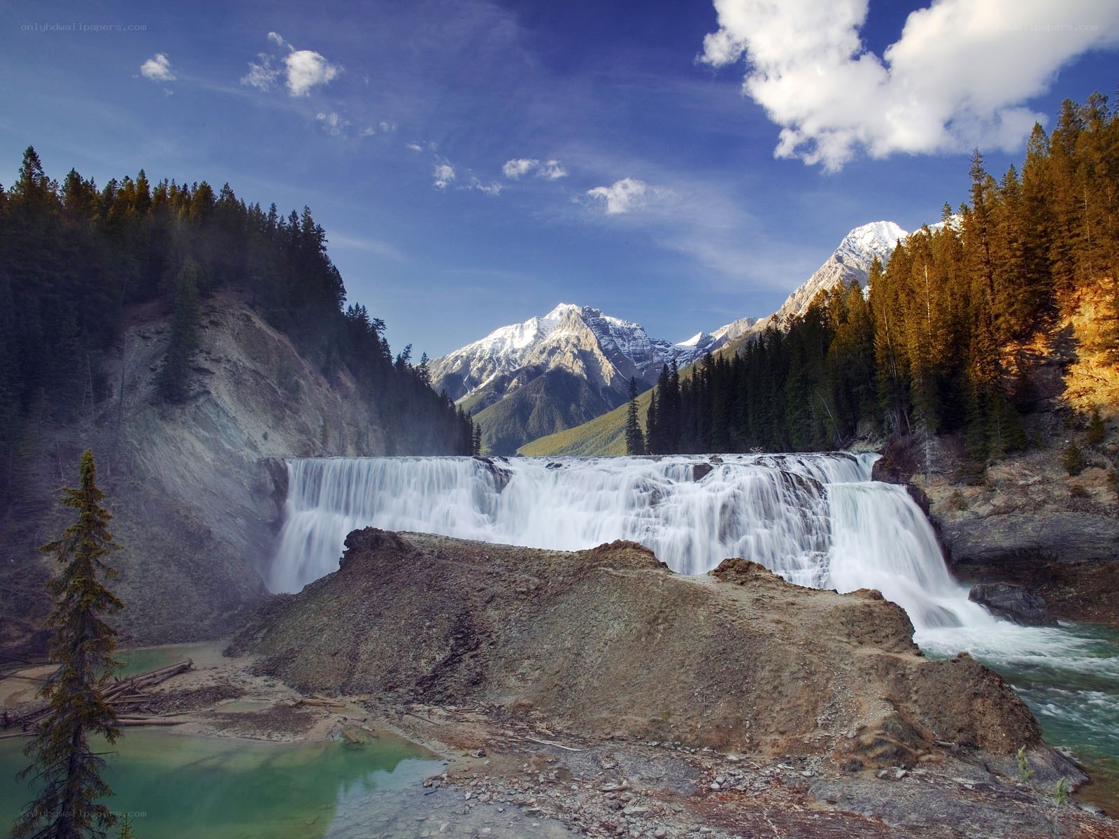 Waterfall in mountain valley