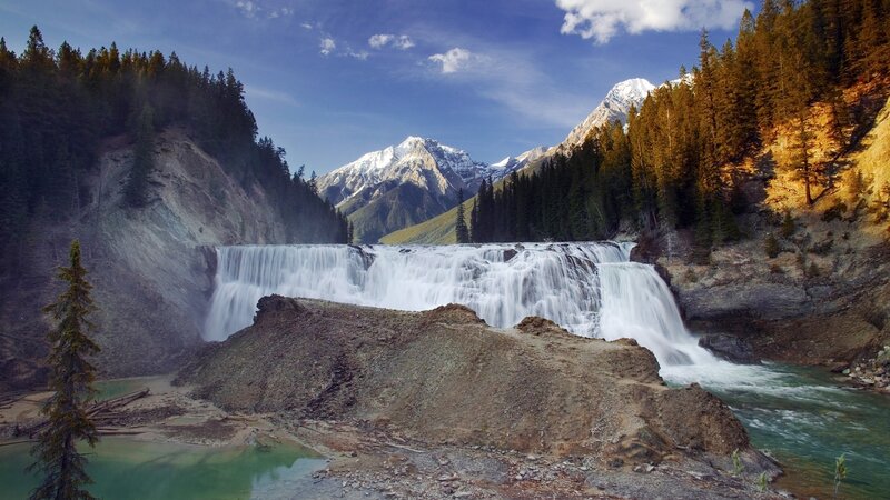 Waterfall in mountain valley