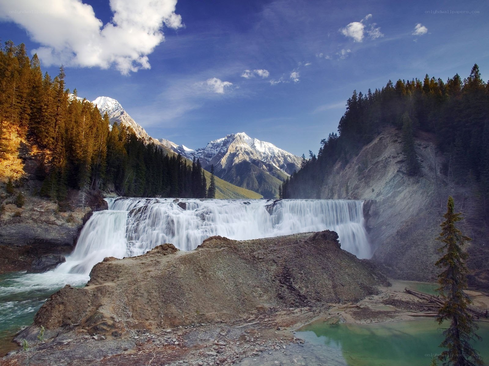 Waterfall in mountain valley