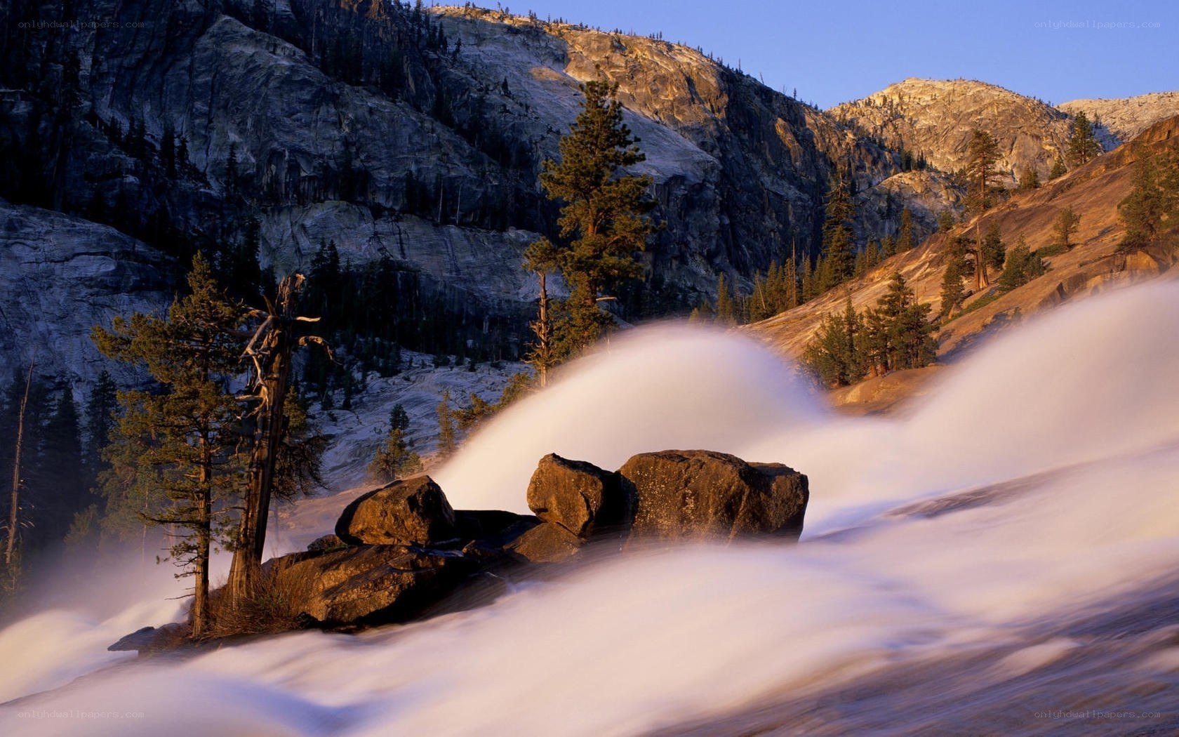 Waterfall in mountain valley
